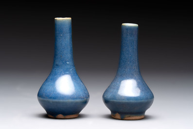 A pair of Chinese powder-blue vases and a blue and white 'Hatcher Cargo' vase, Transitional period
