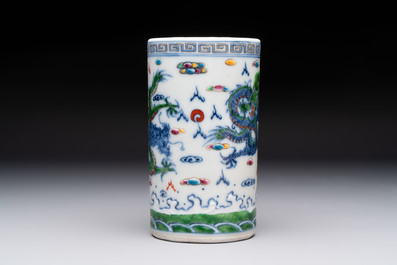 A pair of Chinese famille rose 'crane' cups and a 'dragon' brush pot, Guangxu mark, 20th C.