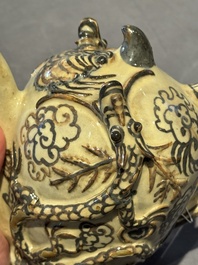 A Chinese Cizhou 'cadogan' ewer with dragons, Yuan/Ming