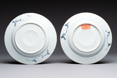 Five Chinese blue and white plates with raised central medallions, Kangxi/Yongzheng