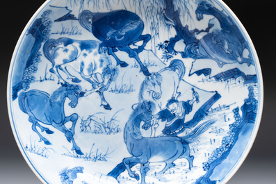 A Chinese blue and white 'Yu Ma Tu 浴馬圖' plate, Kangxi mark and of the period