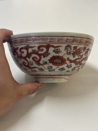 A Chinese wucai 'dragon and phoenix' bowl, Shi 石 mark, Transitional period