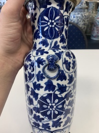 A pair of Chinese blue and white bronze-mounted vases and a covered jar, 19th C.