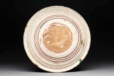 An Italian maiolica dish with a lady, Montelupo, 17th C.