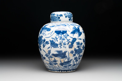 A Chinese blue and white 'birds among flowers' vase and cover, Kangxi
