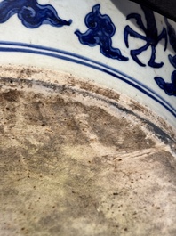 A massive Chinese blue and white 'dragon' fish bowl, Jiajing mark, 20th C.