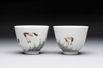 A pair of Chinese famille rose 'crane' cups and a 'dragon' brush pot, Guangxu mark, 20th C.