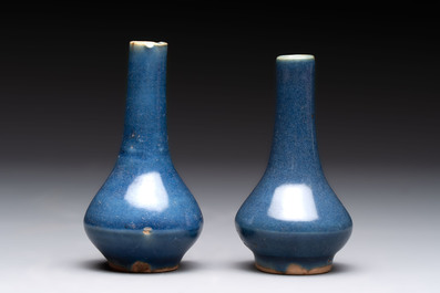 A pair of Chinese powder-blue vases and a blue and white 'Hatcher Cargo' vase, Transitional period