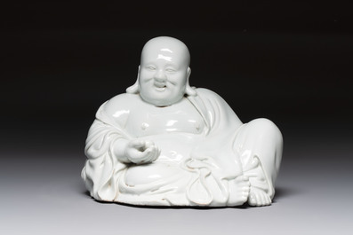 A Chinese famille rose Milefo Buddha and a white-glazed Milefo Buddha, 19th C.