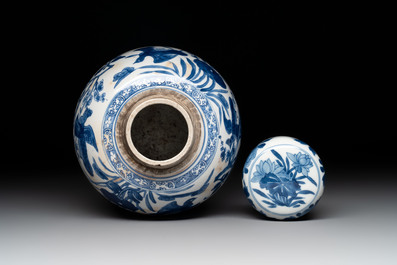 A Chinese blue and white 'birds among flowers' vase and cover, Kangxi