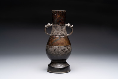 A fine Chinese archaistic bronze 'hu' vase with dragon handles, Yuan
