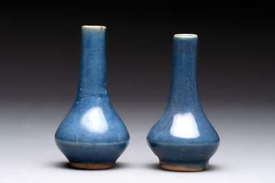 A pair of Chinese powder-blue vases and a blue and white 'Hatcher Cargo' vase, Transitional period