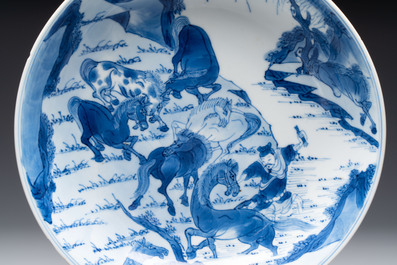 A Chinese blue and white 'Yu Ma Tu 浴馬圖' plate, Kangxi mark and of the period