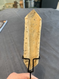 A Tibetan carved bone apron ornament with a dakini, 19th C.
