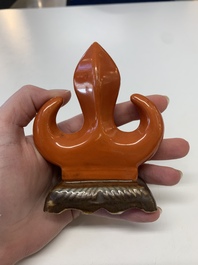 Six Chinese porcelain and glass brush rests, 19/20th C.