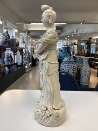 Three Chinese Dehua blanc de Chine figures of Guanyin and a monk, He Chaozong 何朝宗 and Dehua 德化 mark, 20th C.