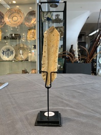 A Tibetan carved bone apron ornament with a dakini, 19th C.
