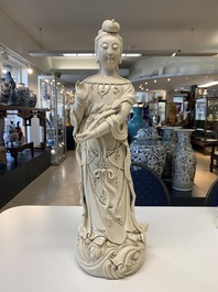 Three Chinese Dehua blanc de Chine figures of Guanyin and a monk, He Chaozong 何朝宗 and Dehua 德化 mark, 20th C.