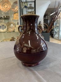 A Chinese flamb&eacute;-glazed 'hu' vase, Qianlong mark, 20th C.
