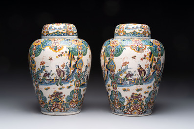 A rare pair of polychrome Dutch Delft chinoiserie jars and covers, 18th C.