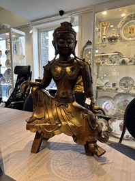 A large Chinese gilt bronze seated Bodhisattva, 20th C.