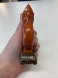 Six Chinese porcelain and glass brush rests, 19/20th C.