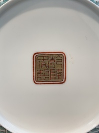 Two Chinese eggshell famille rose 'dragon' bowls on wooden stands, Qianlong mark, 20th C.