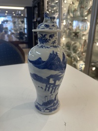 A Chinese blue and white garniture of five vases with river landscapes, 19th C.