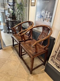 A pair of Chinese wooden 'horseshoe' chairs, 19/20th C.