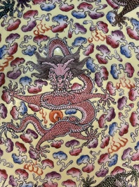Two Chinese eggshell famille rose 'dragon' bowls on wooden stands, Qianlong mark, 20th C.