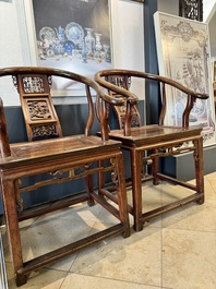 A pair of Chinese wooden 'horseshoe' chairs, 19/20th C.
