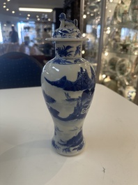 A Chinese blue and white garniture of five vases with river landscapes, 19th C.