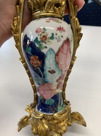 A pair of composed gilt bronze mounted Chinese famille rose 'tobacco leaf' vases, Qianlong