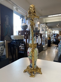 A pair of composed gilt bronze mounted Chinese famille rose 'tobacco leaf' vases, Qianlong