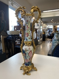 A pair of composed gilt bronze mounted Chinese famille rose 'tobacco leaf' vases, Qianlong
