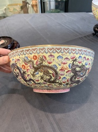 Two Chinese eggshell famille rose 'dragon' bowls on wooden stands, Qianlong mark, 20th C.