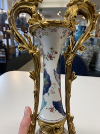 A pair of composed gilt bronze mounted Chinese famille rose 'tobacco leaf' vases, Qianlong