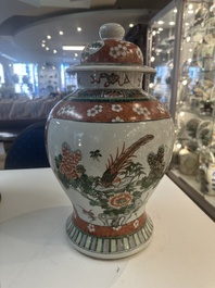 A Chinese famille verte vase and two covered vases, 19th C.