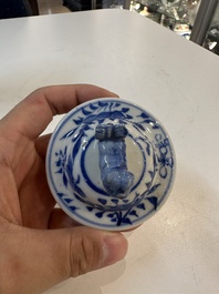 A Chinese blue and white garniture of five vases with river landscapes, 19th C.