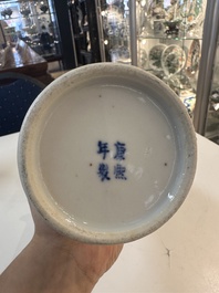 A Chinese blue and white garniture of five vases with river landscapes, 19th C.