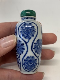 Four Chinese blue, white and copper-red snuff bottles, Yongzheng mark, 19th C.