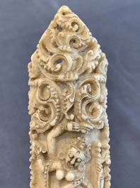 A Tibetan carved bone apron ornament with a dakini, 19th C.