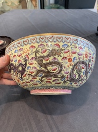 Two Chinese eggshell famille rose 'dragon' bowls on wooden stands, Qianlong mark, 20th C.
