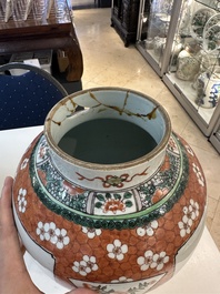 A Chinese famille verte vase and two covered vases, 19th C.