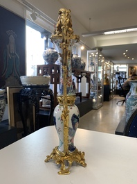 A pair of composed gilt bronze mounted Chinese famille rose 'tobacco leaf' vases, Qianlong