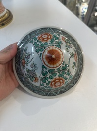 A Chinese famille verte vase and two covered vases, 19th C.