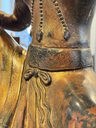 A large Chinese gilt bronze seated Bodhisattva, 20th C.