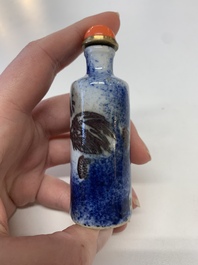 Four Chinese blue, white and copper-red snuff bottles, Yongzheng mark, 19th C.