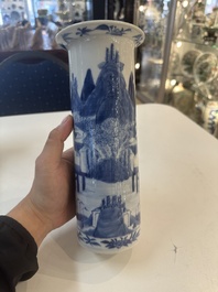 A Chinese blue and white garniture of five vases with river landscapes, 19th C.