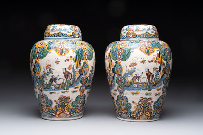 A rare pair of polychrome Dutch Delft chinoiserie jars and covers, 18th C.